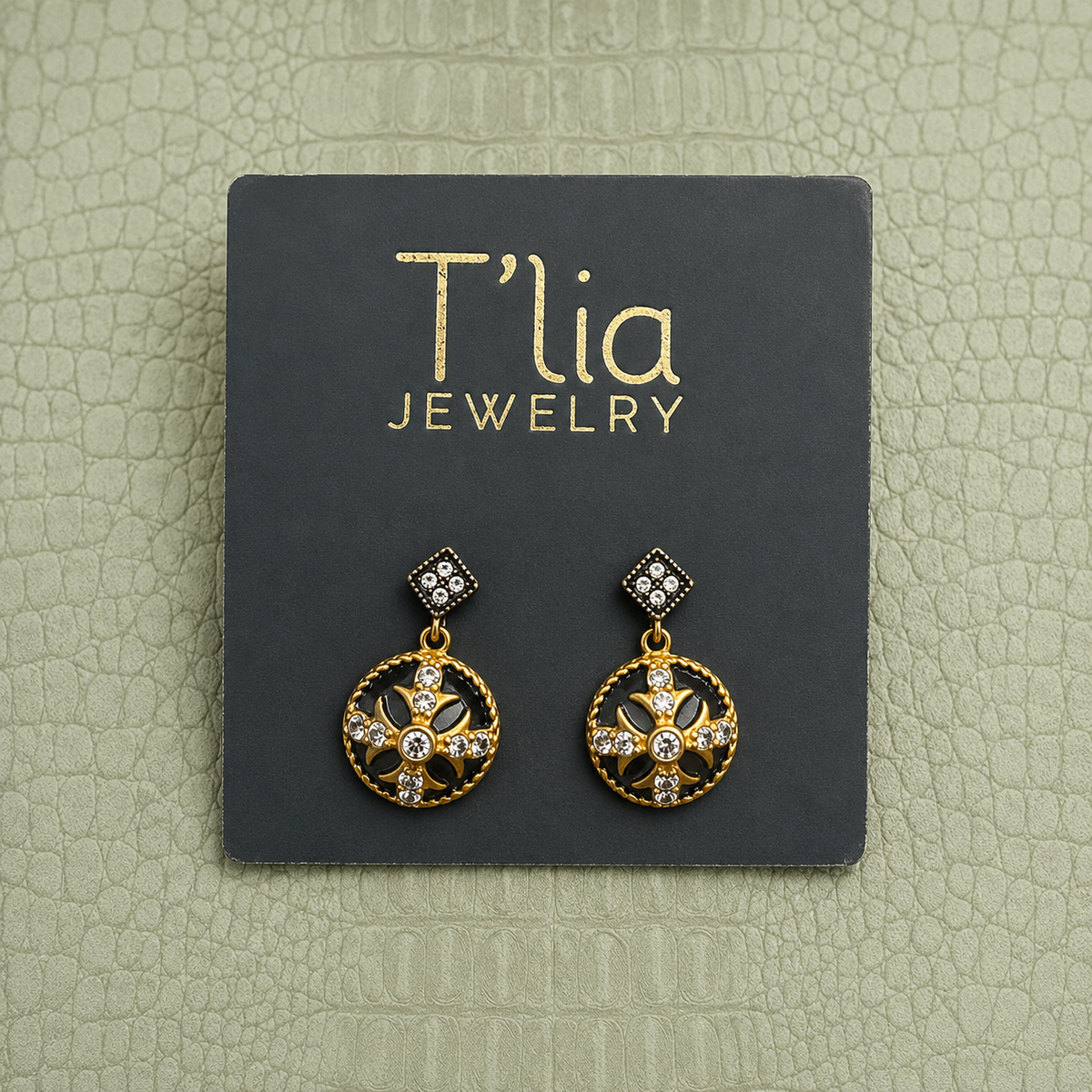 Pendientes de escudo real